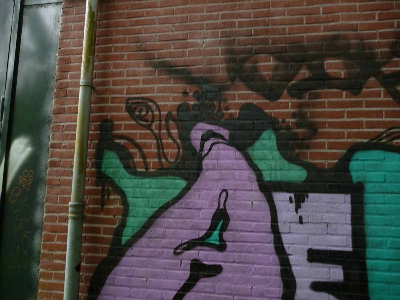 A colorful mural on a city wall